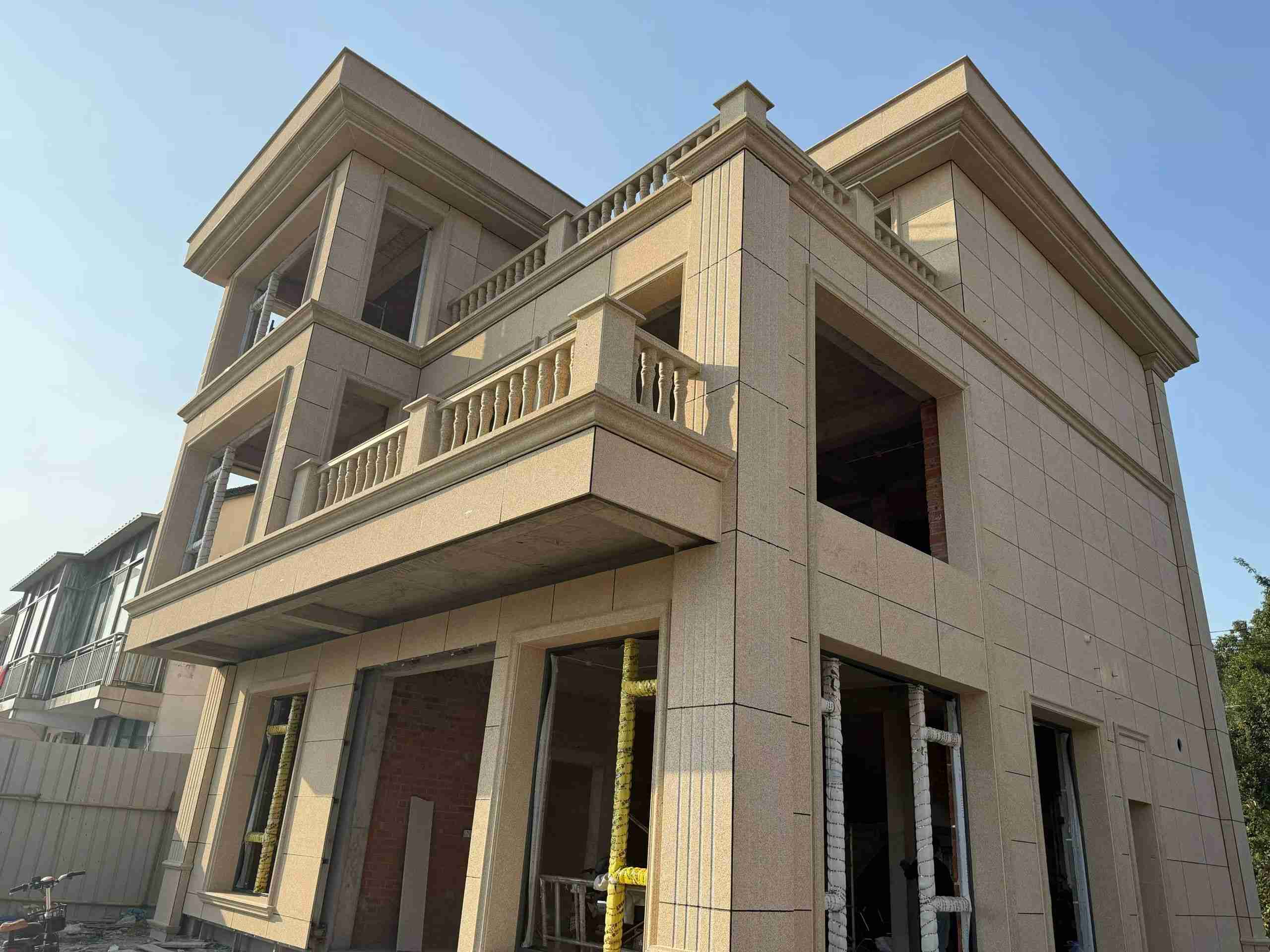 湘潭 黄金麻花岗岩石材荔枝面外墙干挂效果展示