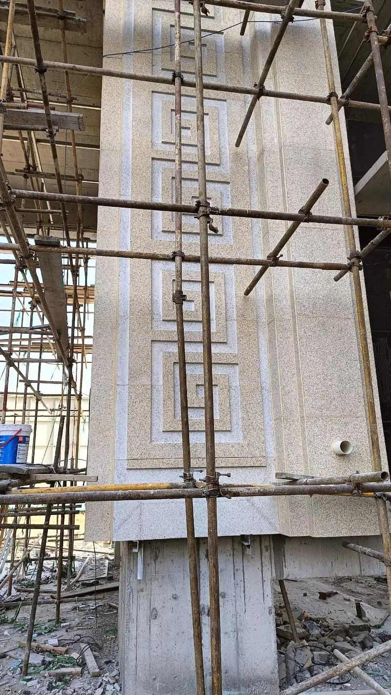 湘潭 黄金麻花岗岩别墅外墙干挂回纹造型效果